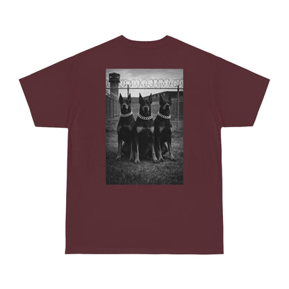 Burgundy unisex streetwear t-shirt with Doberman trio back print, dark aesthetic motivational graphic tee inspired by power, control, discipline, and self-mastery
