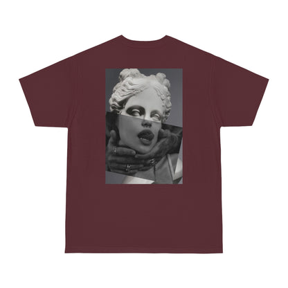 Surreal statue back graphic t-shirt flat lay in burgundy maroon, dark luxury statement tee featuring classical statue with modern surreal collage elements, unisex streetwear t-shirt with bold back artwork
