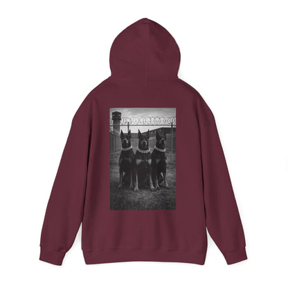 Deep burgundy maroon guard dog hoodie with Doberman back artwork, motivational streetwear symbolizing protection, endurance, leadership energy, and mental toughness