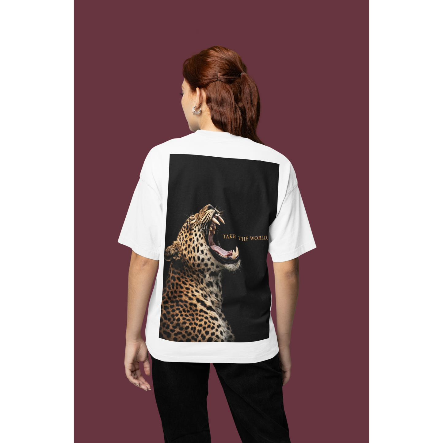 White leopard back graphic t-shirt studio back view featuring roaring leopard artwork and TAKE THE WORLD text, luxury animal fashion