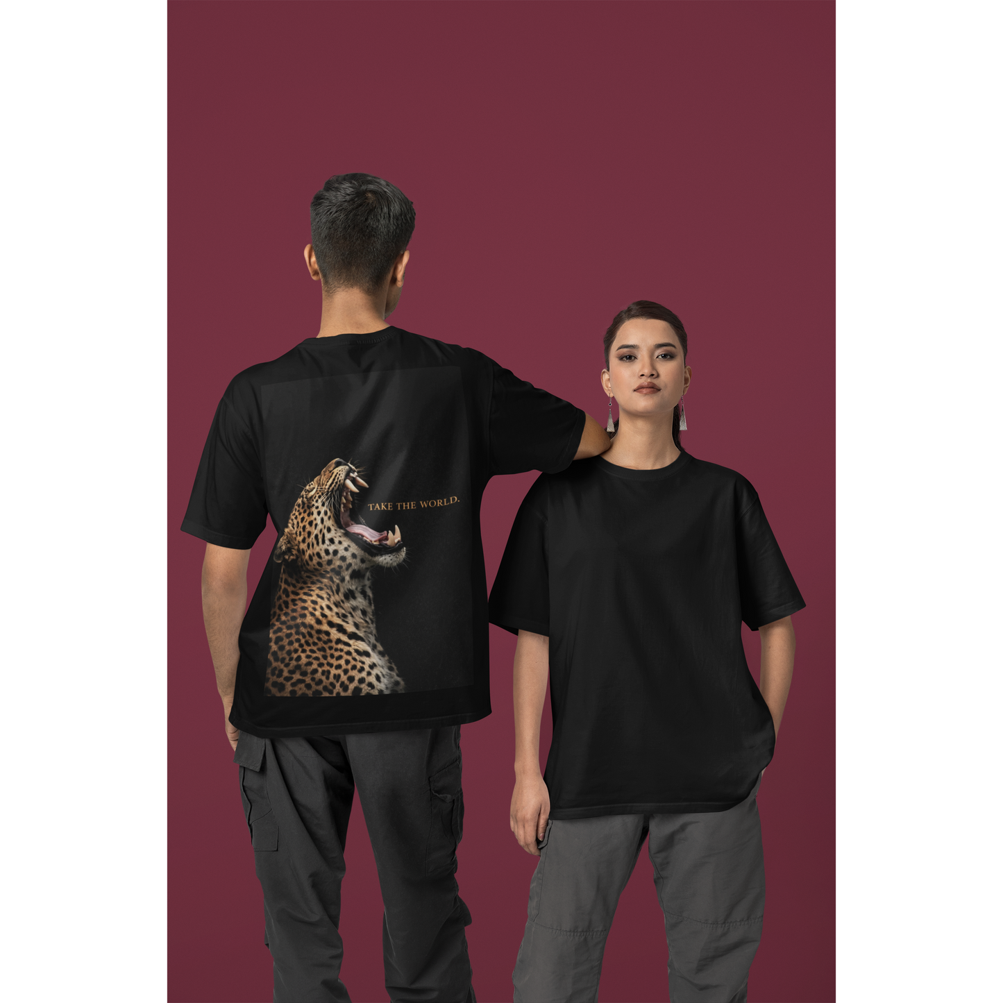 Front and back view black unisex t-shirt set on models, clean minimal front tee and roaring leopard back graphic with TAKE THE WORLD text, luxury animal statement streetwear