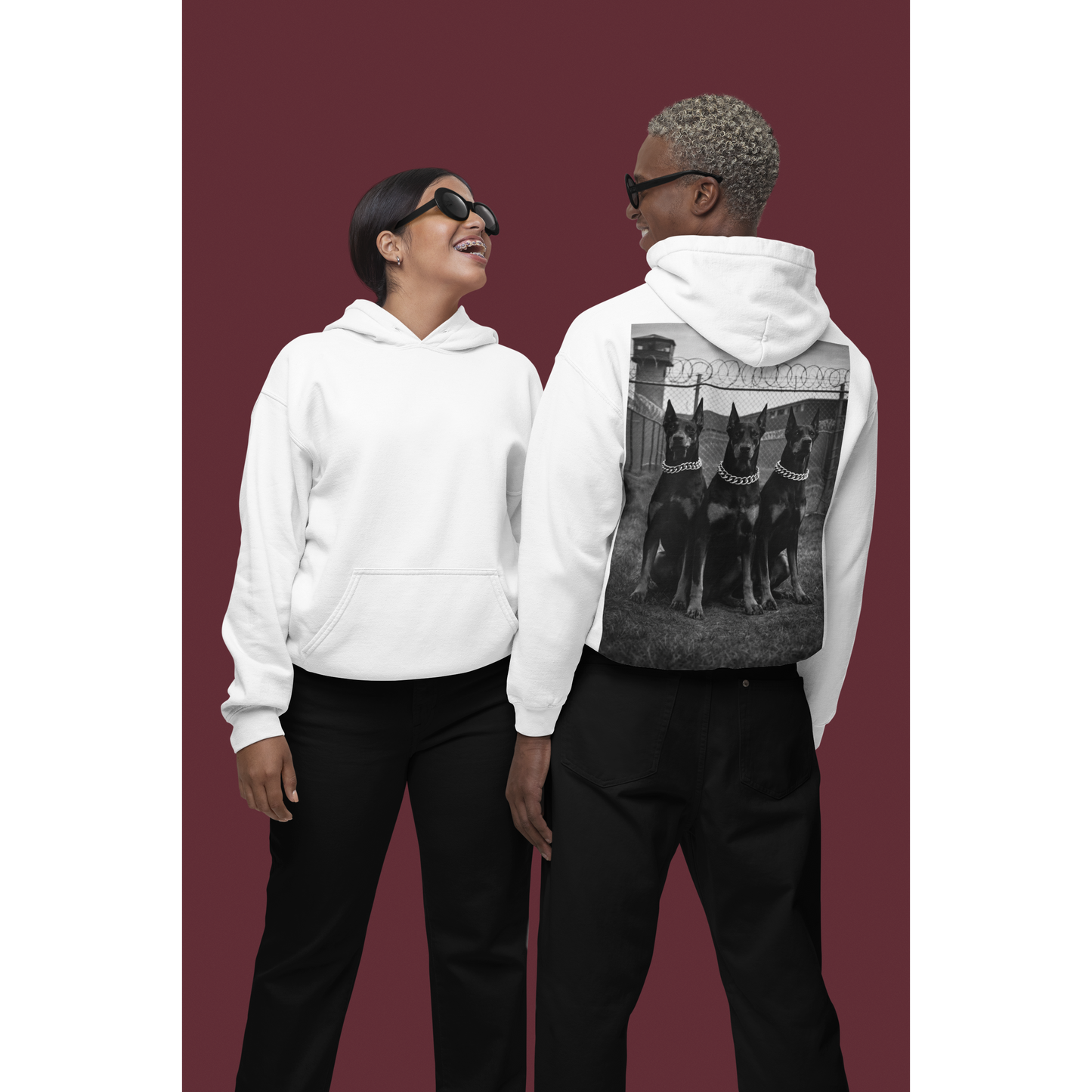Unisex doberman guard dog motivational hoodies worn by models representing strength loyalty and modern streetwear identity