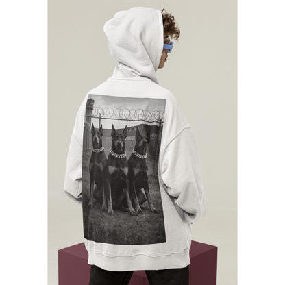 Side view of oversized hoodie featuring doberman guard dog back graphic symbolizing control focus and resilience