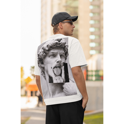 Male model wearing white graphic t-shirt with David statue grunge collage back artwork, urban gothic streetwear fashion, statement art t-shirt outfit