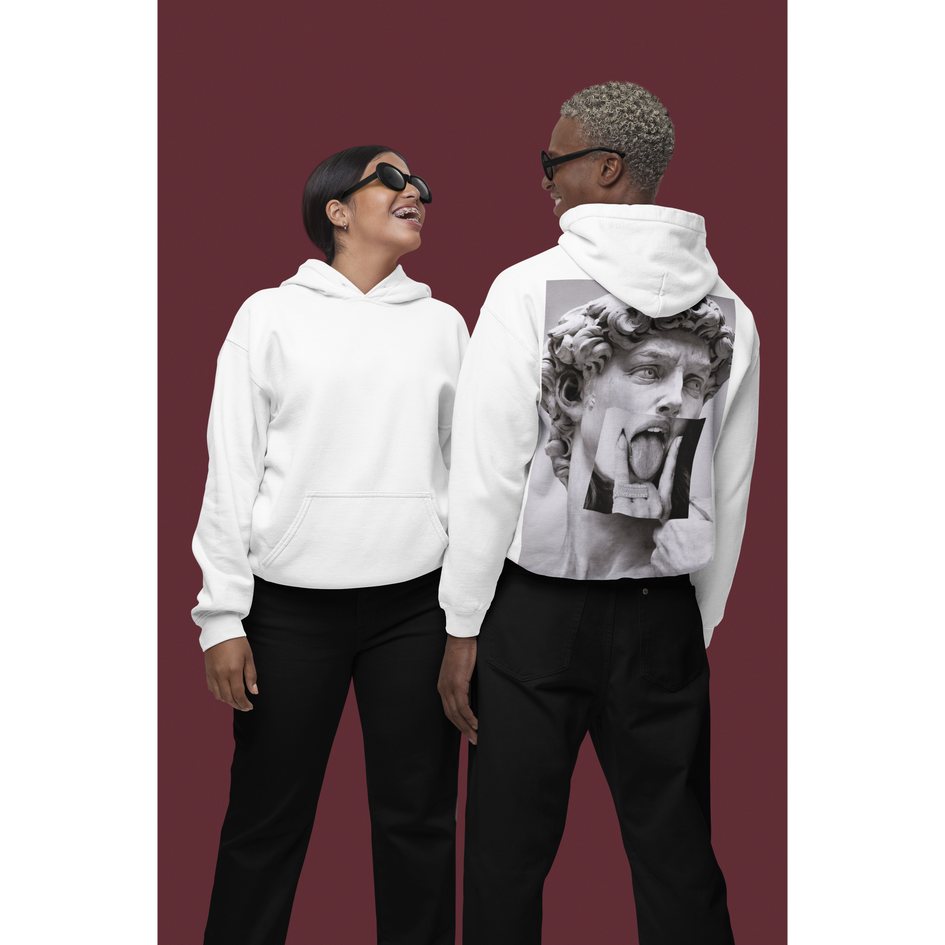 White unisex hoodies worn by models showing classical statue collage back graphic, modern art inspired streetwear hoodies with statement artwork