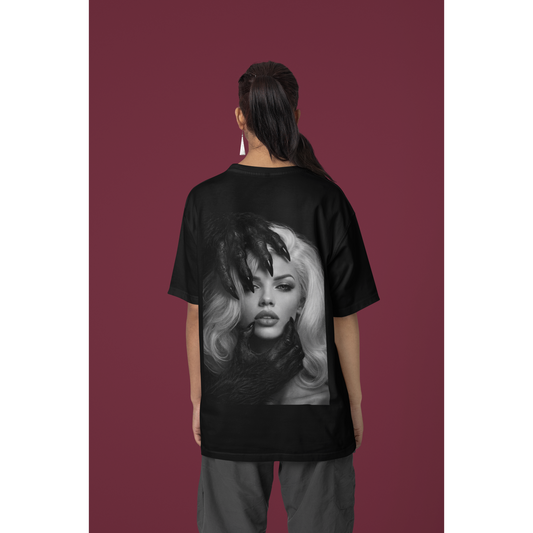 Female model wearing black dark feminine back graphic t-shirt in studio, unisex gothic luxury statement tee featuring dark feminine portrait artwork on the back with clean front design