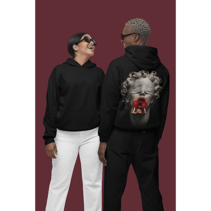 Two models wearing black hoodies with blindfolded classical statue back graphic, surreal marble sculpture with red lollipops, unisex streetwear
