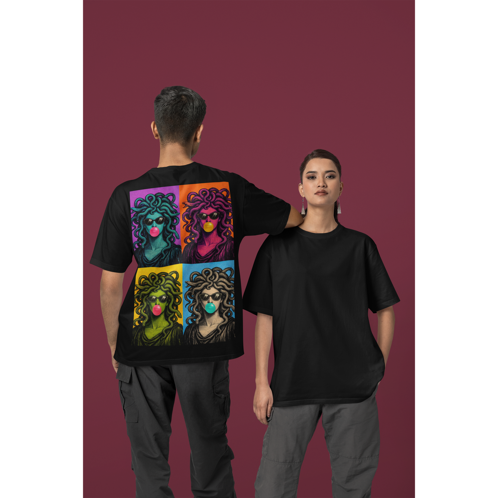 Black pop art Medusa back graphic t-shirt worn by models, unisex streetwear tee featuring bold pop art Medusa collage artwork printed on the back with vibrant color panels, sunglasses, and bubblegum details paired with a clean black front