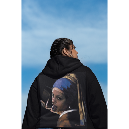 Lifestyle shot of model wearing black Classical Girl with a Pearl unfiltered collage back graphic hoodie, dark luxury streetwear hoodie with bold classical artwork on the back and clean minimalist front