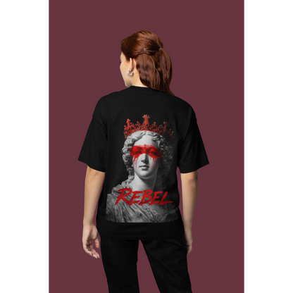 Model wearing black Rebel classical statue back graphic t-shirt, unisex dark luxury streetwear tee featuring crowned marble sculpture with red paint across the eyes and “REBEL” text, clean black front design