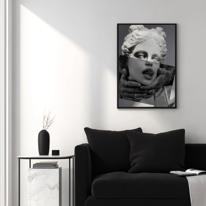 Modern statue collage wall art above black sofa in minimal white living room, black and white classical portrait decor