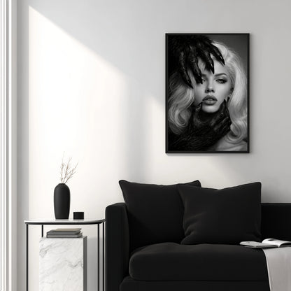 Black and white surreal woman portrait wall art above black sofa in minimal white interior, modern monochrome portrait statement wall decor