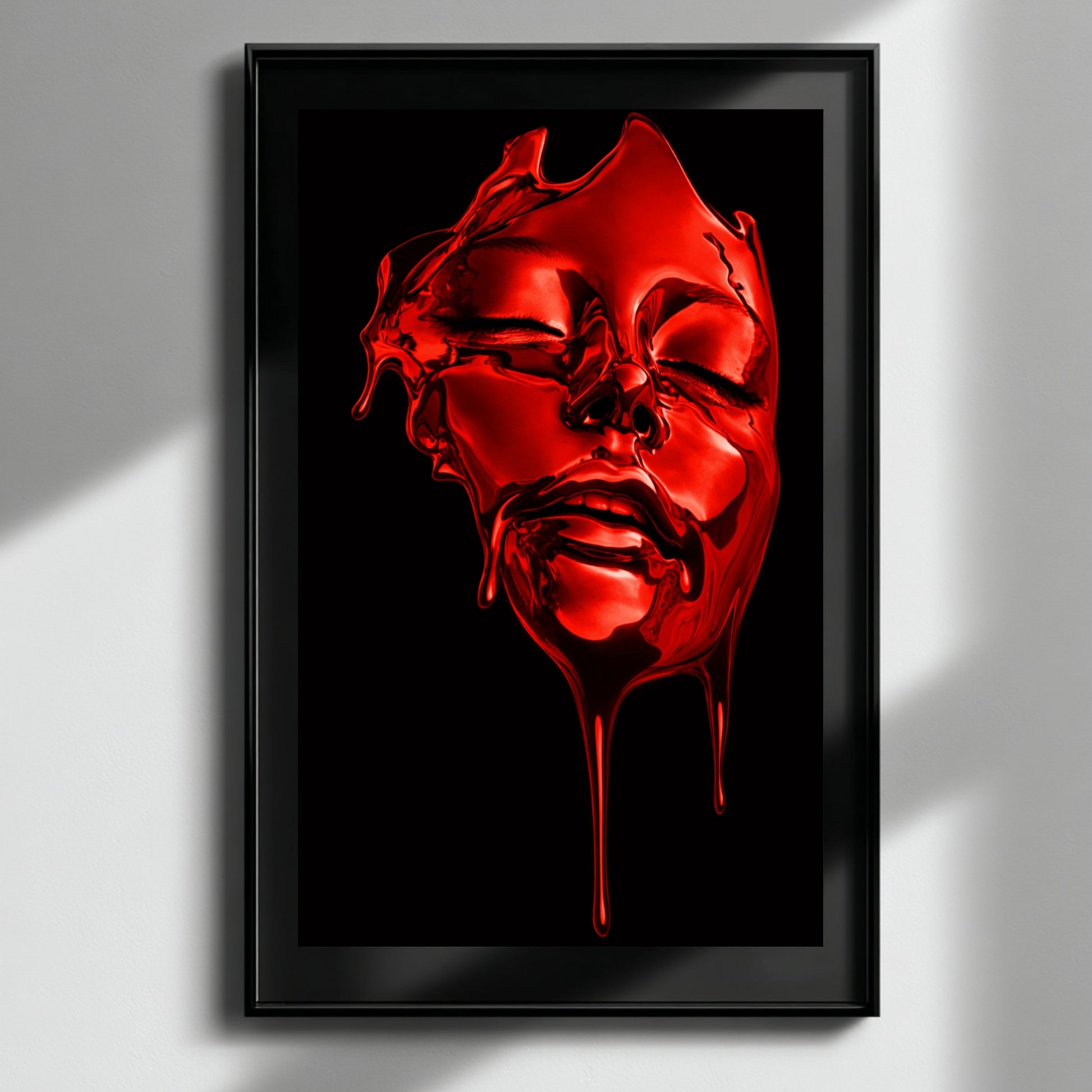 Red surreal face wall art abstract liquid portrait in black frame on light textured wall with shadows – modern abstract statement wall art for minimalist interior