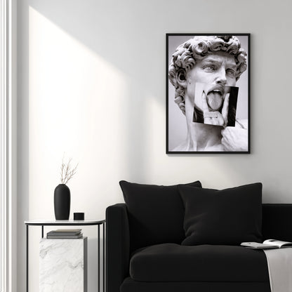 Classical sculpture collage wall art above black sofa in modern white living room, contemporary statement wall decor