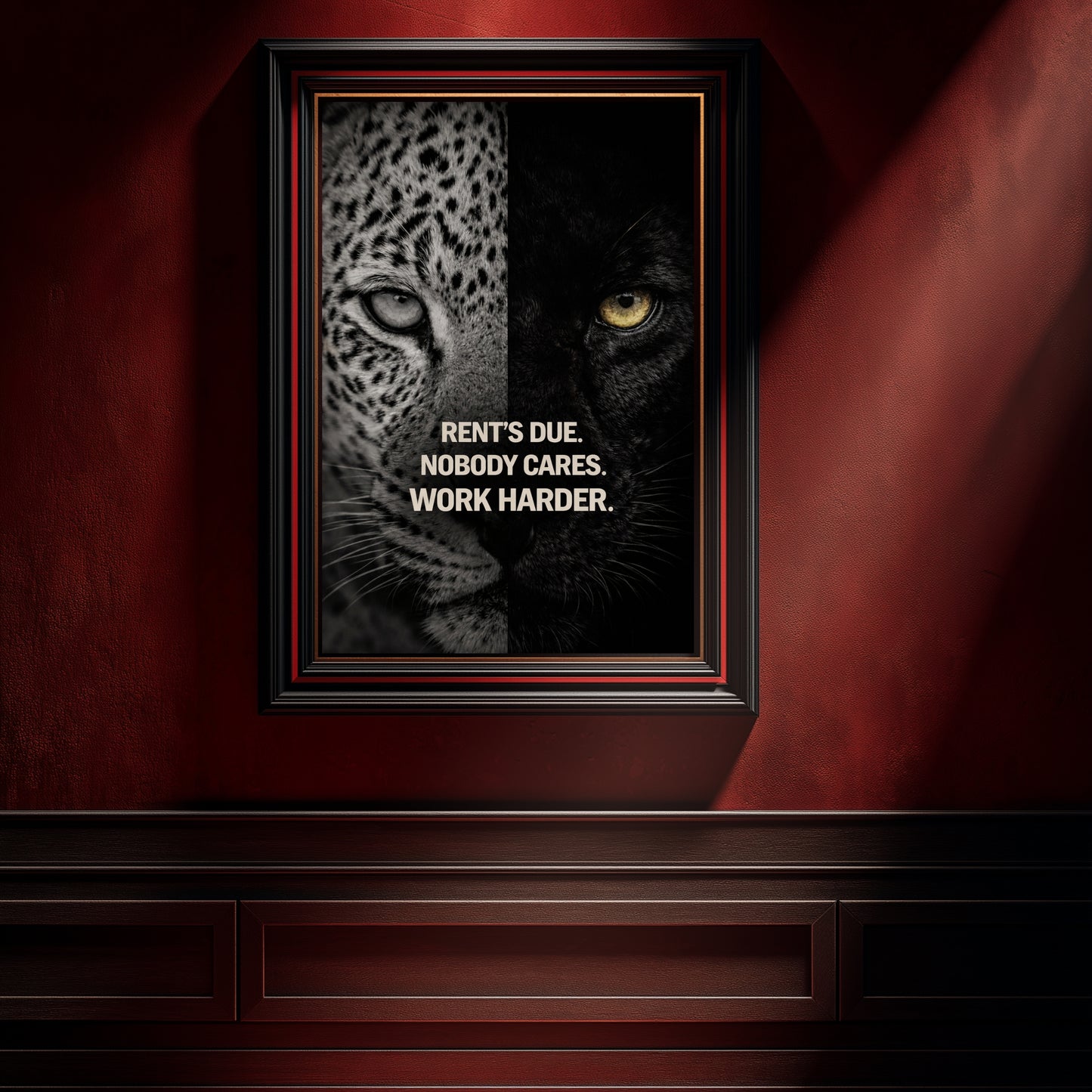 Leopard and panther motivational wall art with bold rent’s due work harder statement framed in black and gold against dramatic red luxury interior wall.