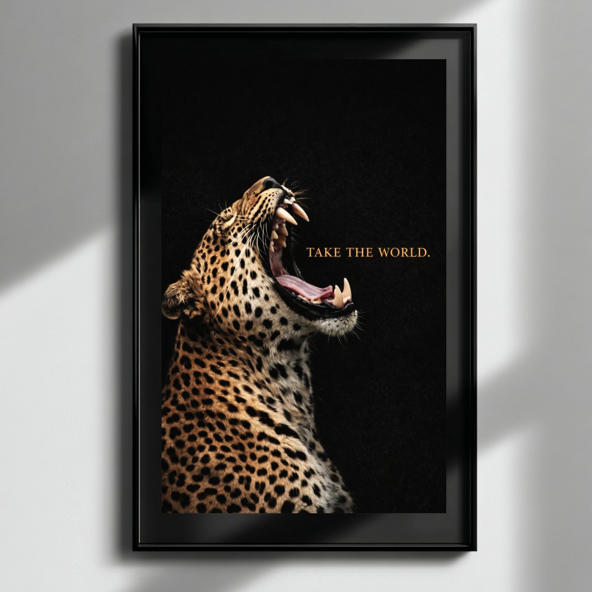 Leopard statement wall art framed on minimal white wall, Take the World motivational wildlife artwork modern decor