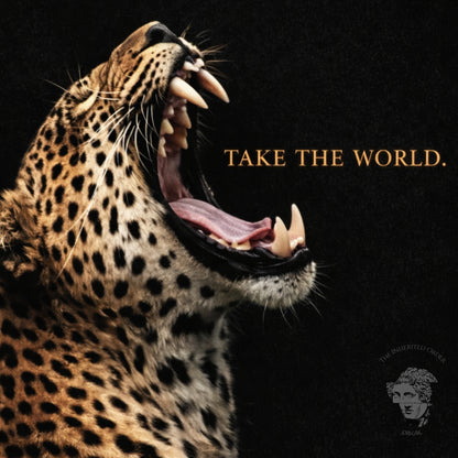 Leopard Take the World wall art above black sofa in modern white living room, motivational wildlife statement artwork decor