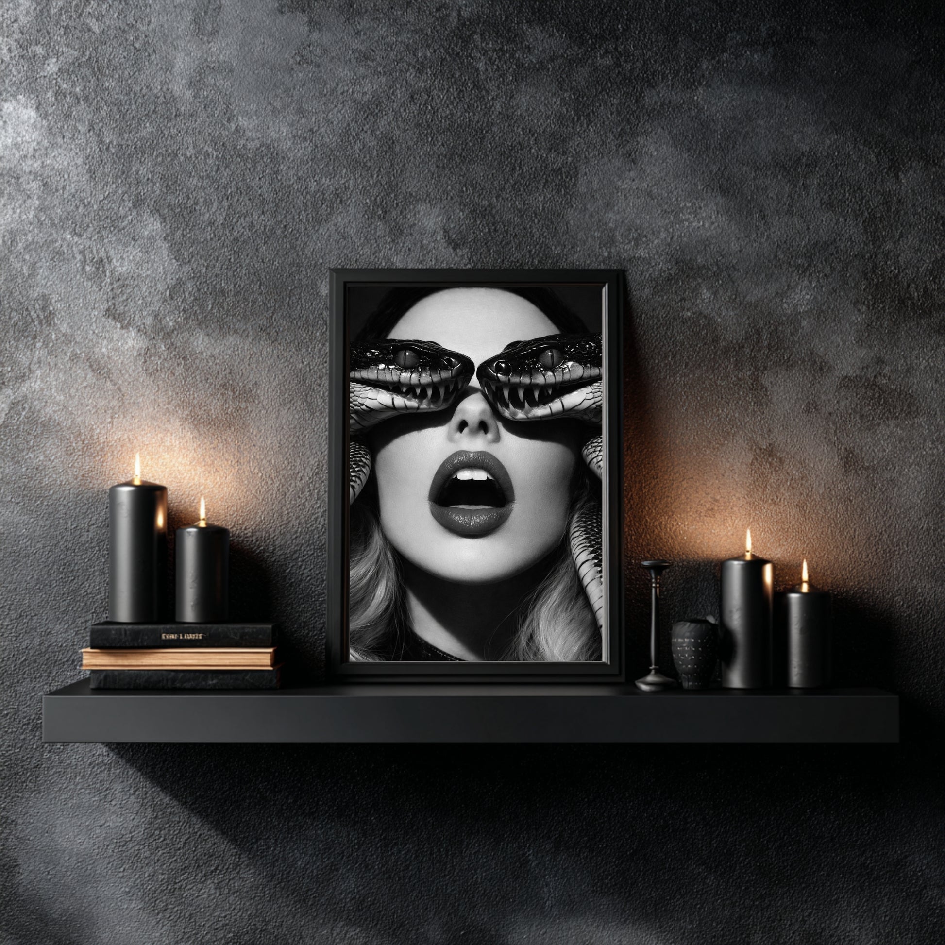 Black and white snake face wall art styled on floating shelf with black candles, high contrast surreal serpent portrait print