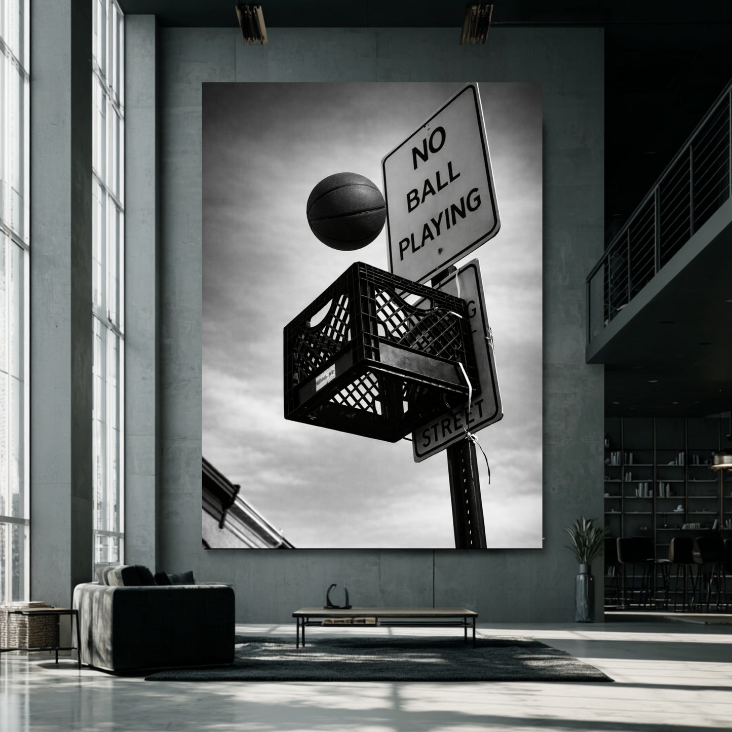 Oversized black and white street basketball canvas in modern industrial loft, milk crate hoop beneath no ball playing sign bold urban statement art