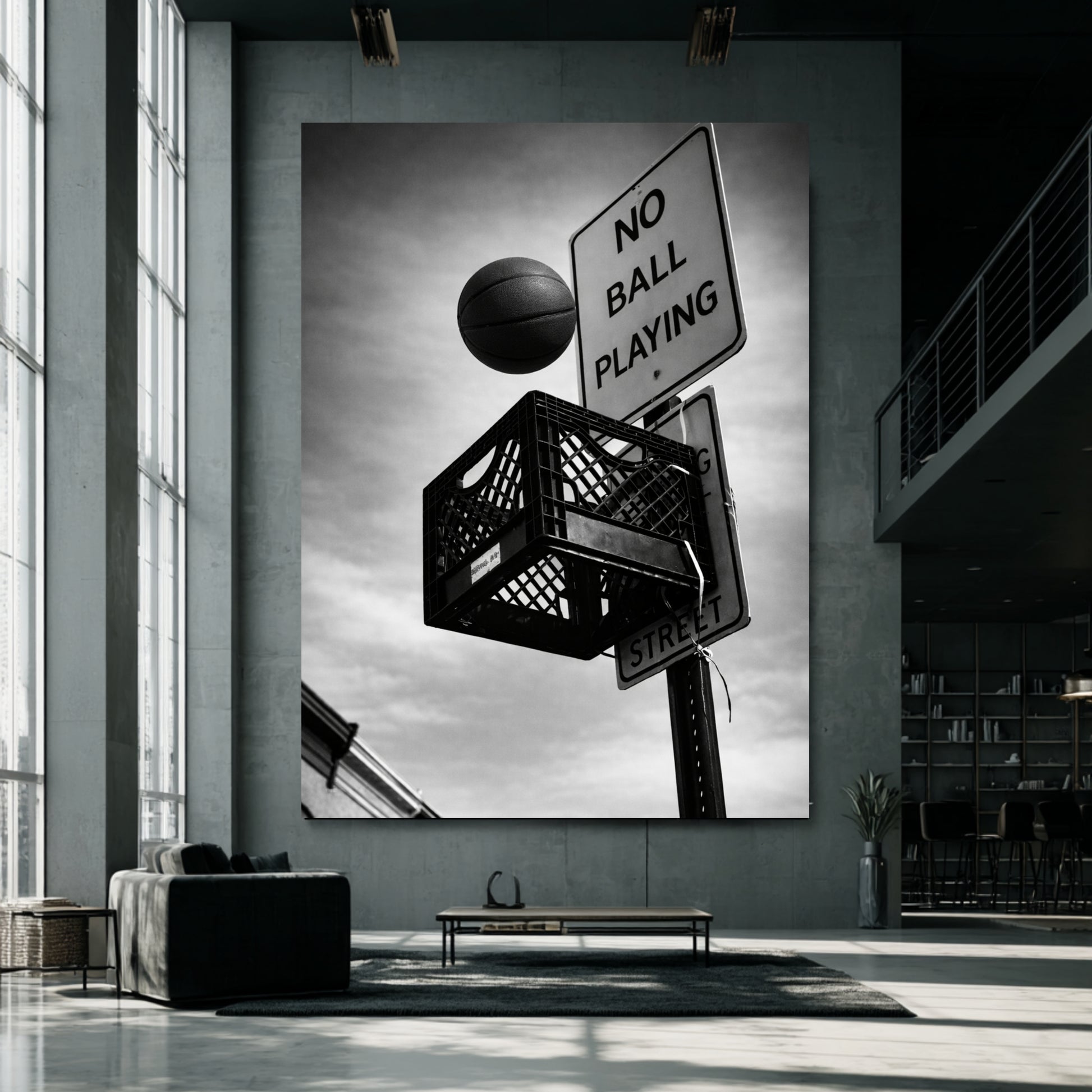 Oversized black and white street basketball canvas in modern industrial loft, milk crate hoop beneath no ball playing sign bold urban statement art
