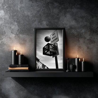 Framed monochrome street basketball print on black shelf with candles, milk crate hoop under no ball playing sign urban sports wall decor