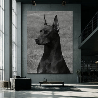 Oversized black and white Doberman portrait canvas displayed in modern industrial loft interior