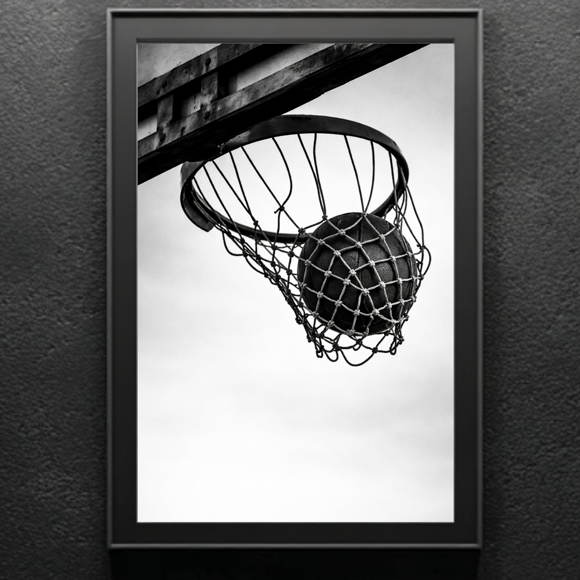 Gallery-style black and white basketball hoop wall art framed in classic molding, minimal monochrome sports photography statement print