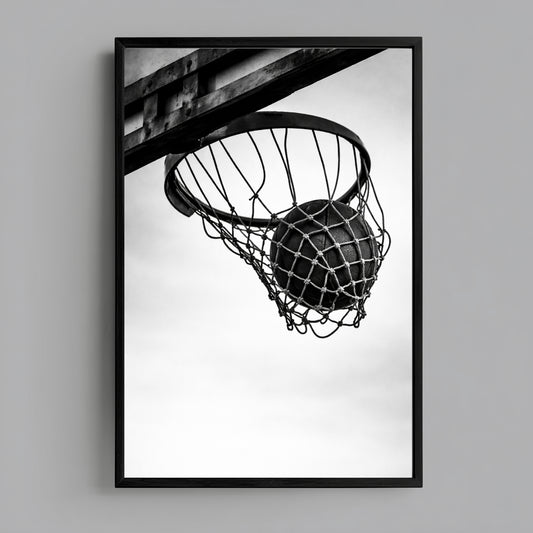 Black and white basketball hoop wall art in sleek black frame against light background, minimal athletic discipline photography print