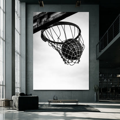 Oversized black and white basketball hoop wall art installed in modern concrete loft interior, minimalist sports discipline statement print