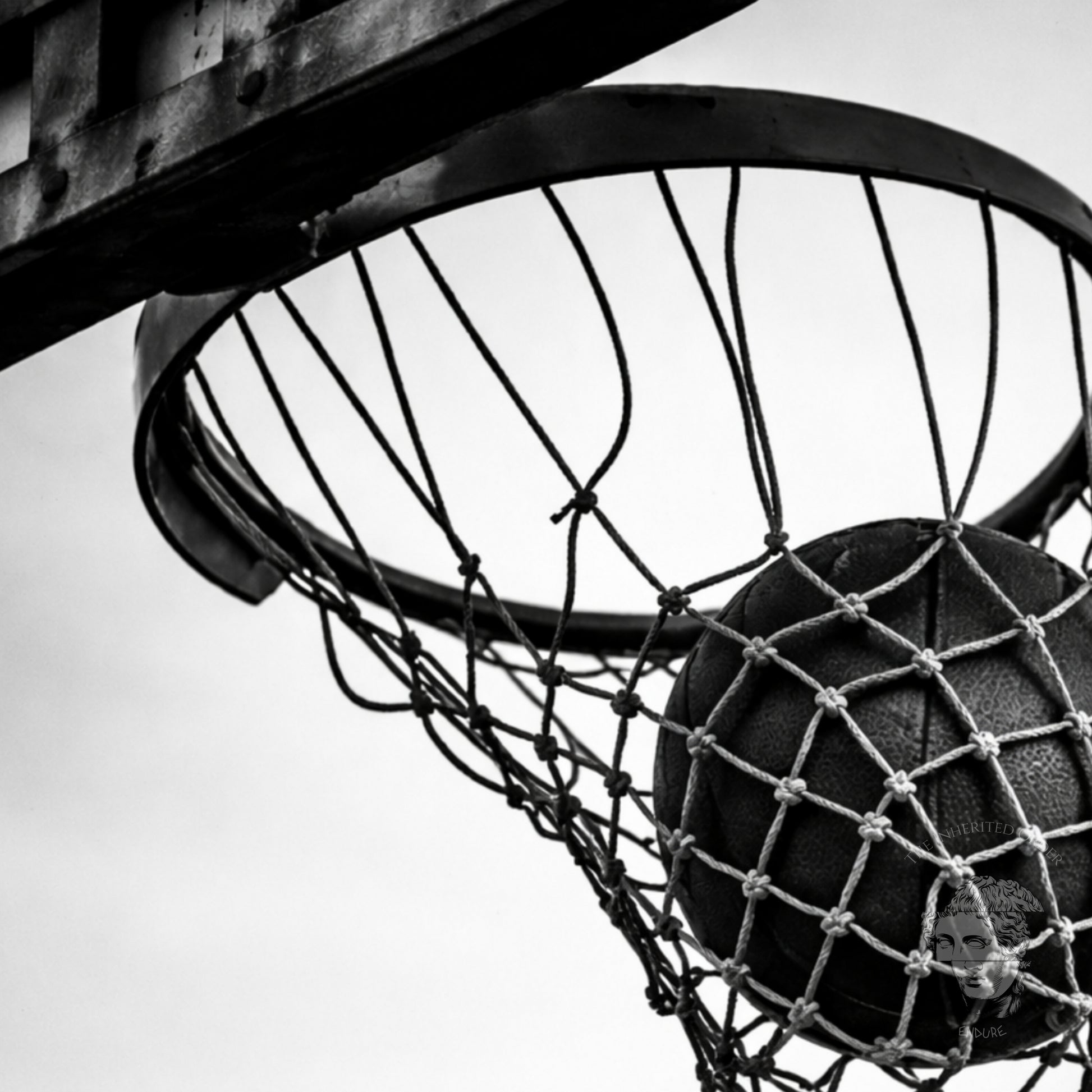 Gallery-style black and white basketball hoop wall art framed in classic molding, minimal monochrome sports photography statement print