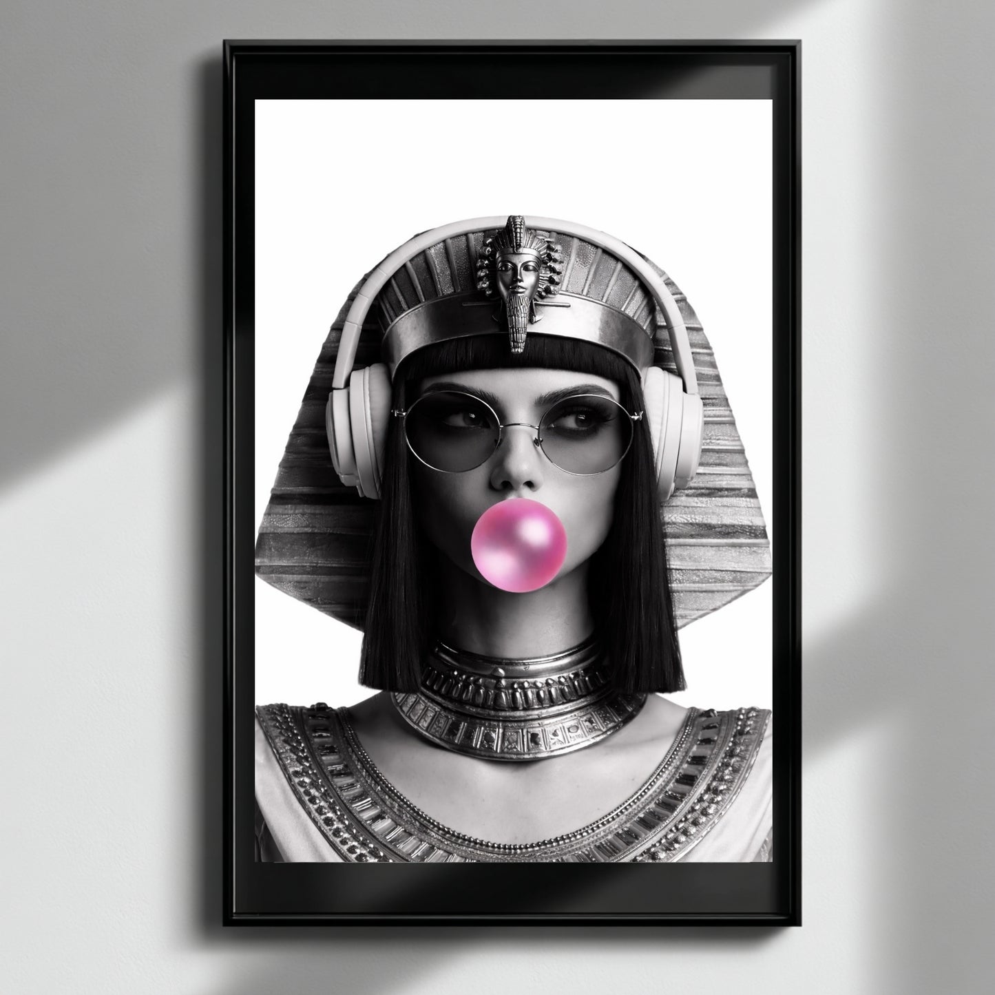 Modern Egyptian queen monochrome portrait wall art framed on clean white wall, contemporary pop culture statement decor