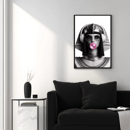 Modern Egyptian queen wall art above black sofa in modern white living room, monochrome pop culture portrait statement decor