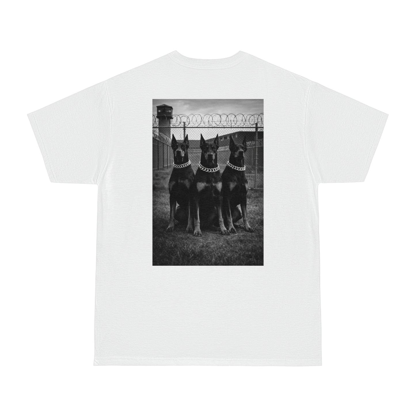White unisex streetwear t-shirt with black and white Doberman trio back graphic, dark motivational artwork symbolizing discipline, loyalty, strength, and endurance