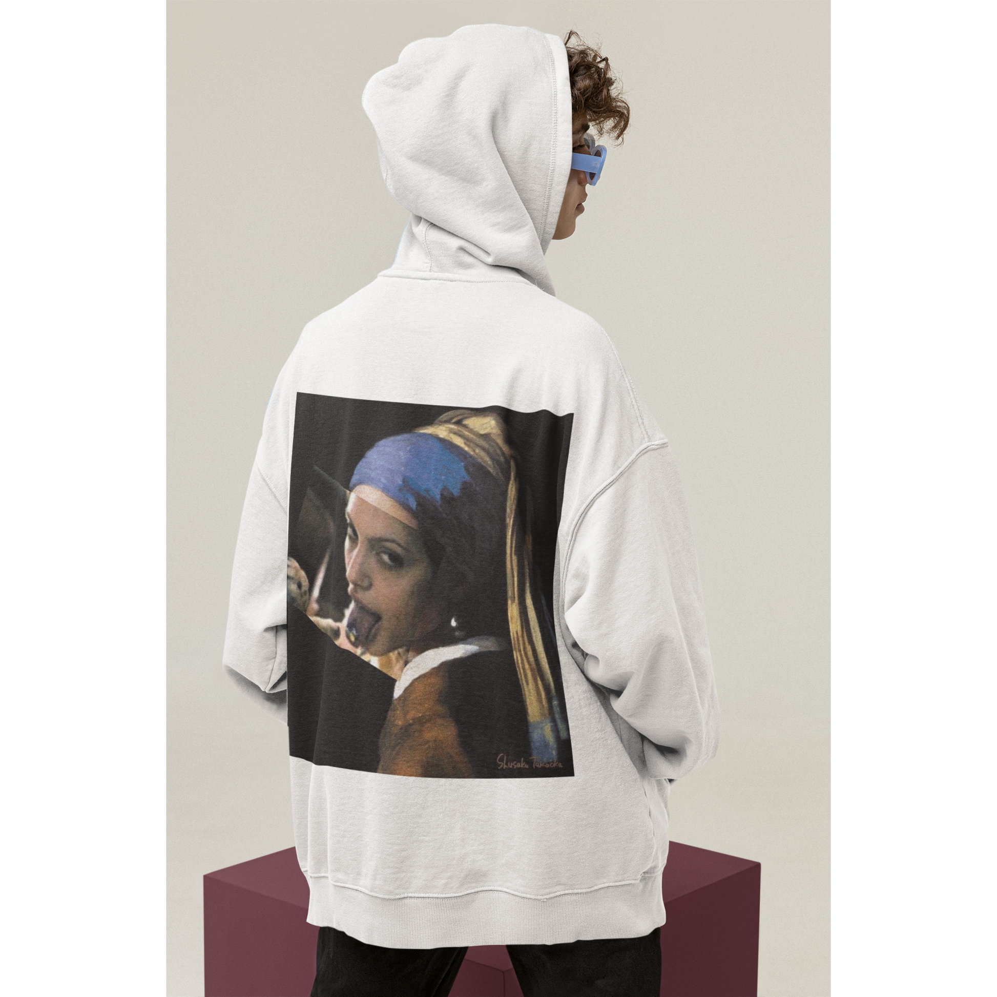 Studio model wearing white Classical Girl with a Pearl unfiltered collage back graphic hoodie, unisex dark luxury pullover hoodie featuring classical art remix artwork printed on the back